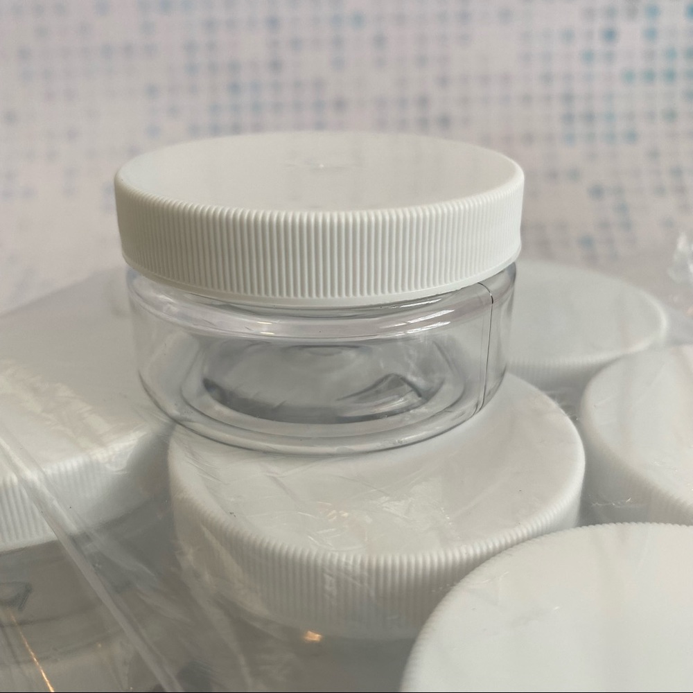 New! Empty 2oz plastic reusable jars with white lid. 12pcs